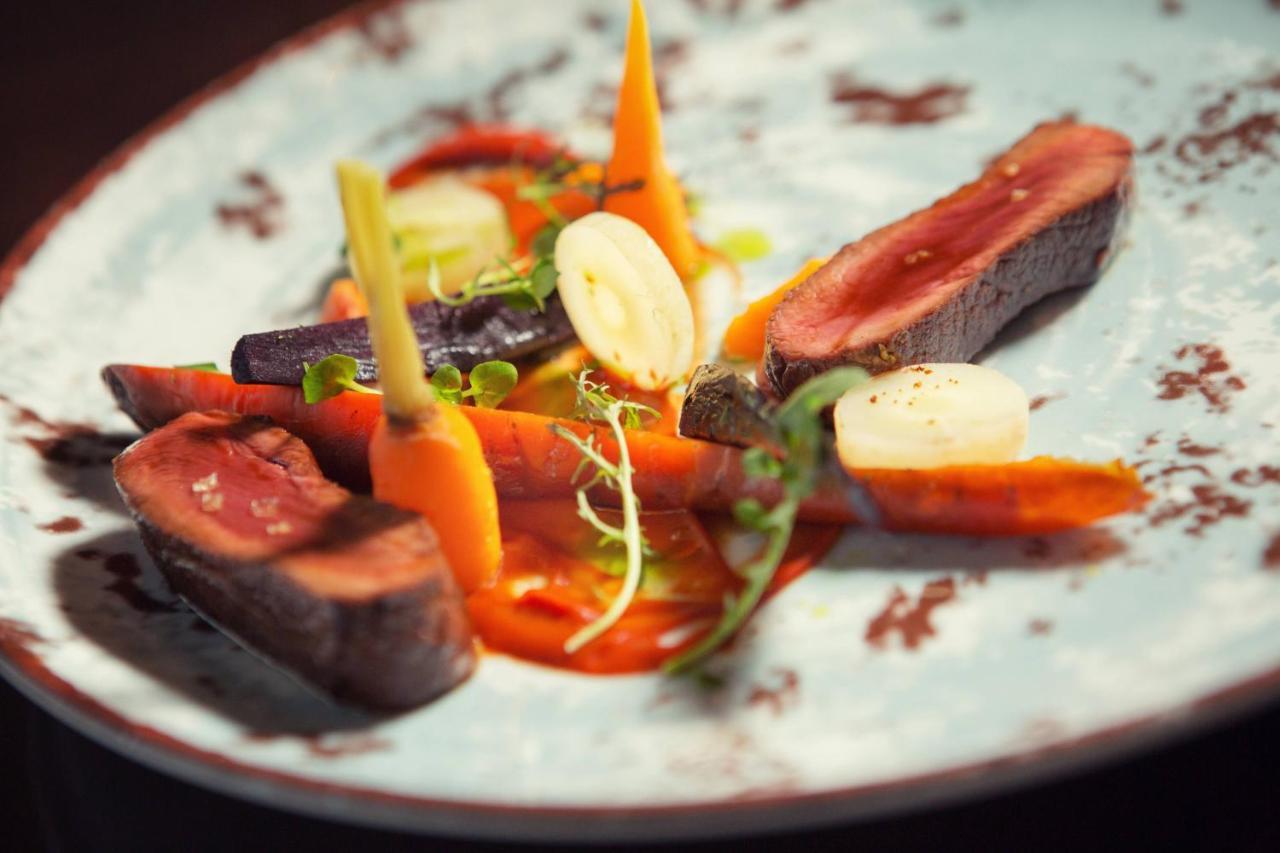 Grand Hotel River Park, A Luxury Collection Hotel, Братислава Экстерьер фото A plate of duck confit with vegetables